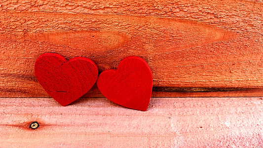 photo of two red heart wooden decors thumbnail