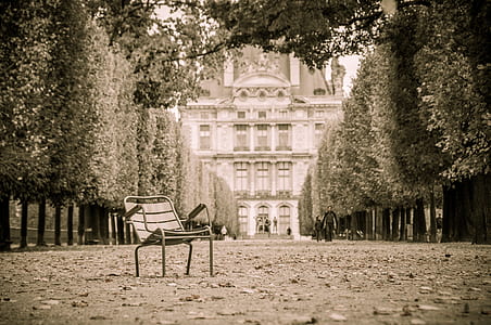 steel armchair in middle of pathway thumbnail