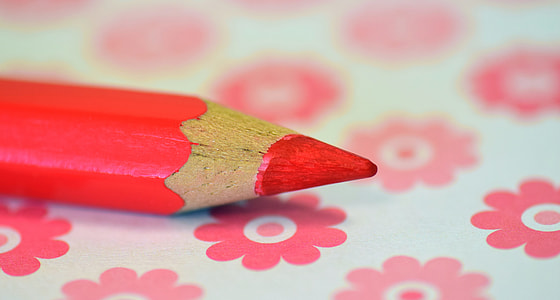 shallow focus photography of red color pencil thumbnail