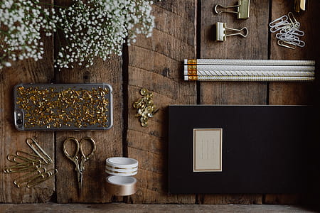 Office accessories on an old wooden tray thumbnail