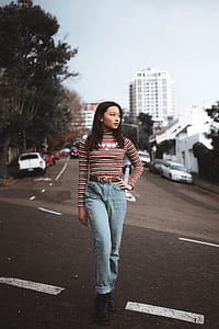woman in the center of the road thumbnail