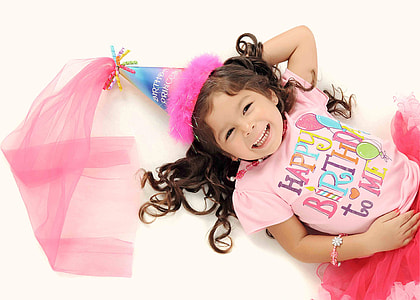 Birthday Girl in birthday t-shirt and hat thumbnail