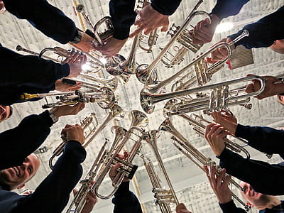 group of band holding trumpets thumbnail
