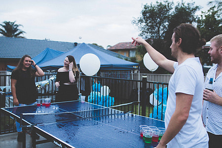 people playing beer pong thumbnail
