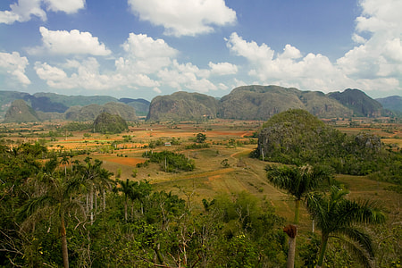 This landscape was taken at Viñales Valley in the Pinar del Río Province of Cuba. With spectacular rock formations and a lush tropical climate, this area was named a UNESCO World Heritage Site in 1999 thumbnail