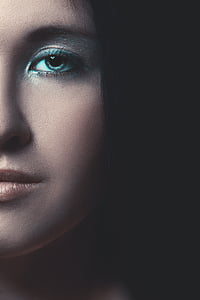 close up image of woman's left side face painting thumbnail