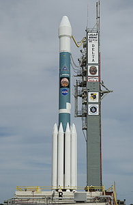 white and green USAF space shuttle during daytime thumbnail