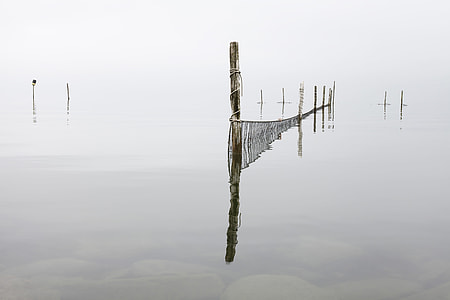 mirror photography of brown sea barricade thumbnail