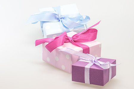 three assorted-color gift boxes thumbnail