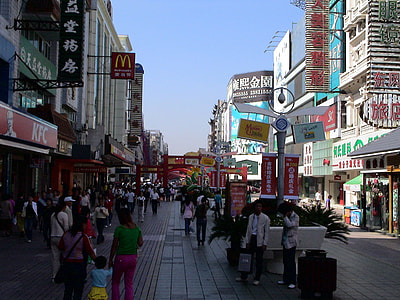 people standing near buildings during daytime thumbnail