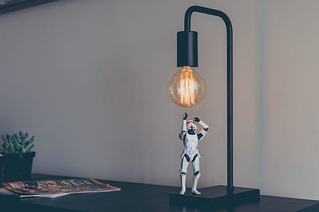Star Wars Stormtrooper action figure on black tube lamp thumbnail
