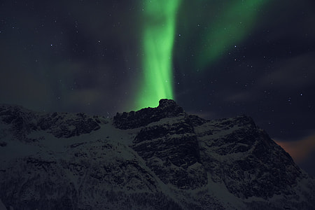 snow covered mountain under Aurora thumbnail