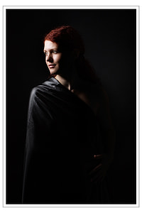 woman wearing black robe thumbnail