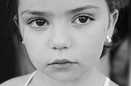grayscale portrait photograph of girl wearing spaghetti-strap top thumbnail