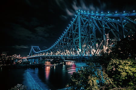 gray suspension bridge near body of water thumbnail