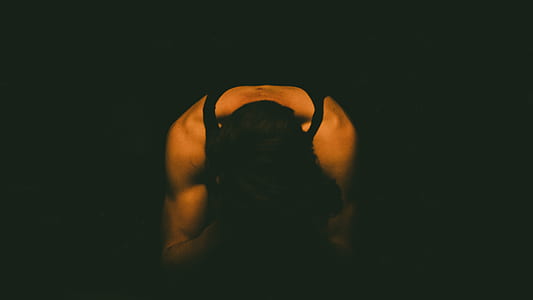 person wearing black tank top thumbnail
