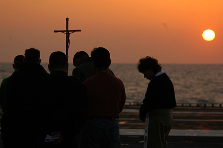 group of person praying together thumbnail