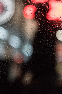 bokeh photography of glass with dew drops thumbnail