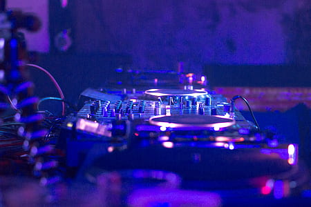focus photo of gray and black DJ turntable thumbnail