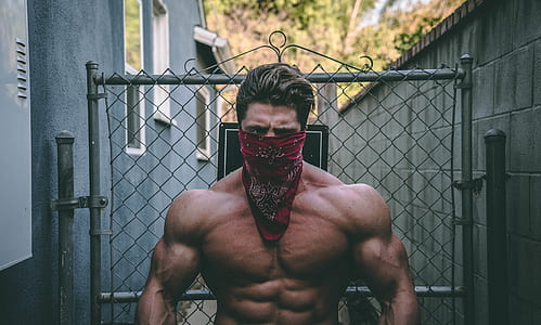 topless buffed man with red handkerchief as mask thumbnail