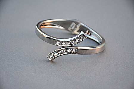 silver-colored ring with gemstones thumbnail