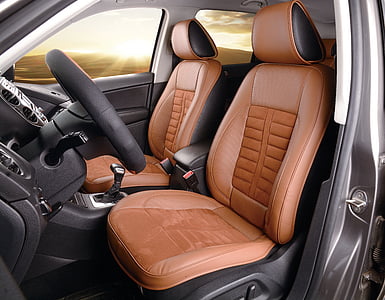 brown and black leather vehicle interior thumbnail