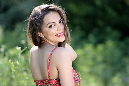 woman in pink spaghetti strap thumbnail