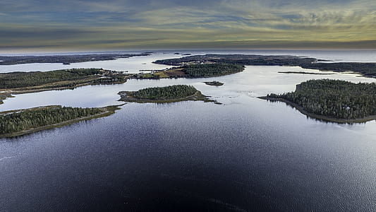 aerial photography of body of water with islets thumbnail