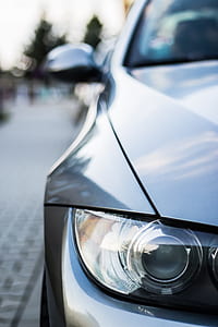 close-up photography of silver vehicle thumbnail