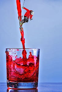 shot glass with red liquor thumbnail