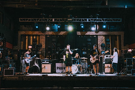 band singing on stage thumbnail