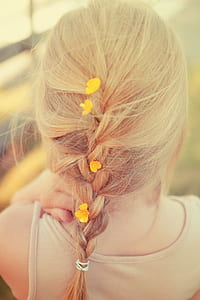 braided hair with yellow flowers thumbnail