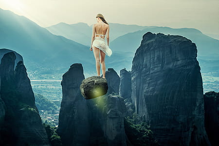 woman standing on stone thumbnail