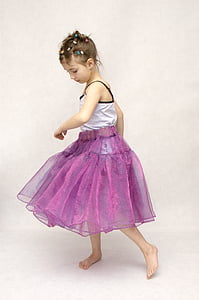 girl wearing purple tutu skirt and white camisole thumbnail