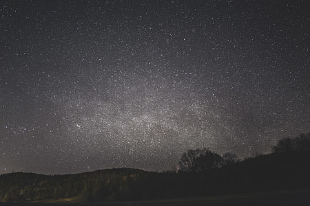 silhouette of mountain during nighttime thumbnail