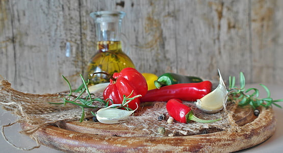garlic and chili pepper on chopping board thumbnail