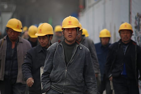 man wearing yellow hardhat thumbnail