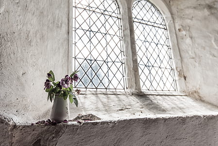 white ceramic vase beside window thumbnail