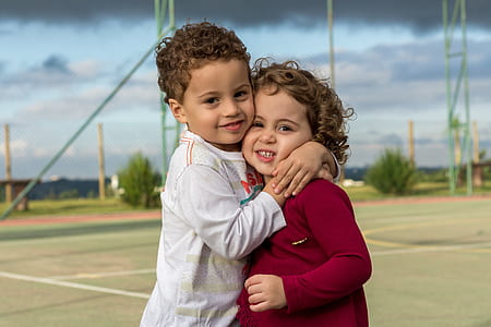 boy and girl hugging each other thumbnail