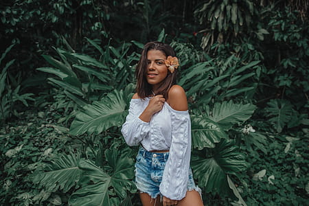 woman wearing blue cold-shoulder long-sleeved blouse thumbnail