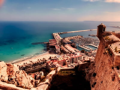 bird's-eye view photography of coastal city thumbnail