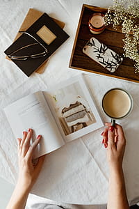 Woman read book and drink coffee thumbnail