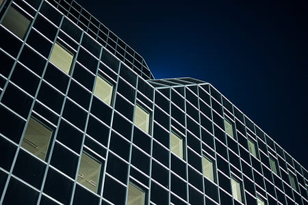 low-angle photography of building during nighttime thumbnail