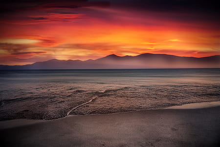 photo of seashore during golden hour thumbnail
