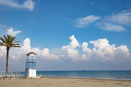 white life guard house during daytime thumbnail
