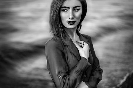 grayscale photography of woman standing thumbnail