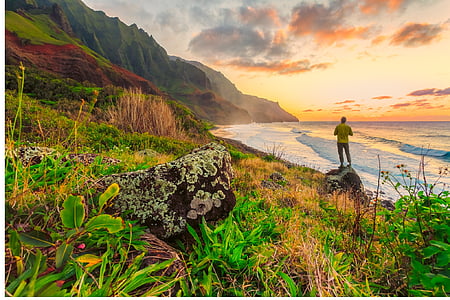 man standing on beach sand thumbnail