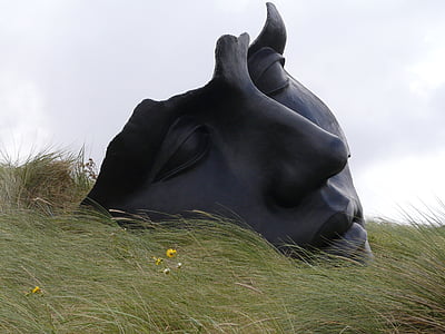 black ceramic face statue thumbnail