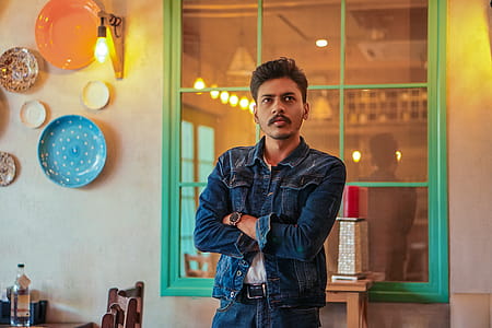 Man Standing Near Window thumbnail