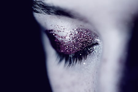 selective focus photography of women's glitter eyeshadow thumbnail
